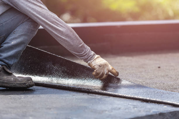 Professional Basement Waterproofing technician working in Dupont, PA